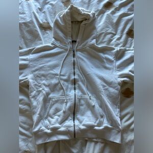 Brandy Melville cream zip up hoodie